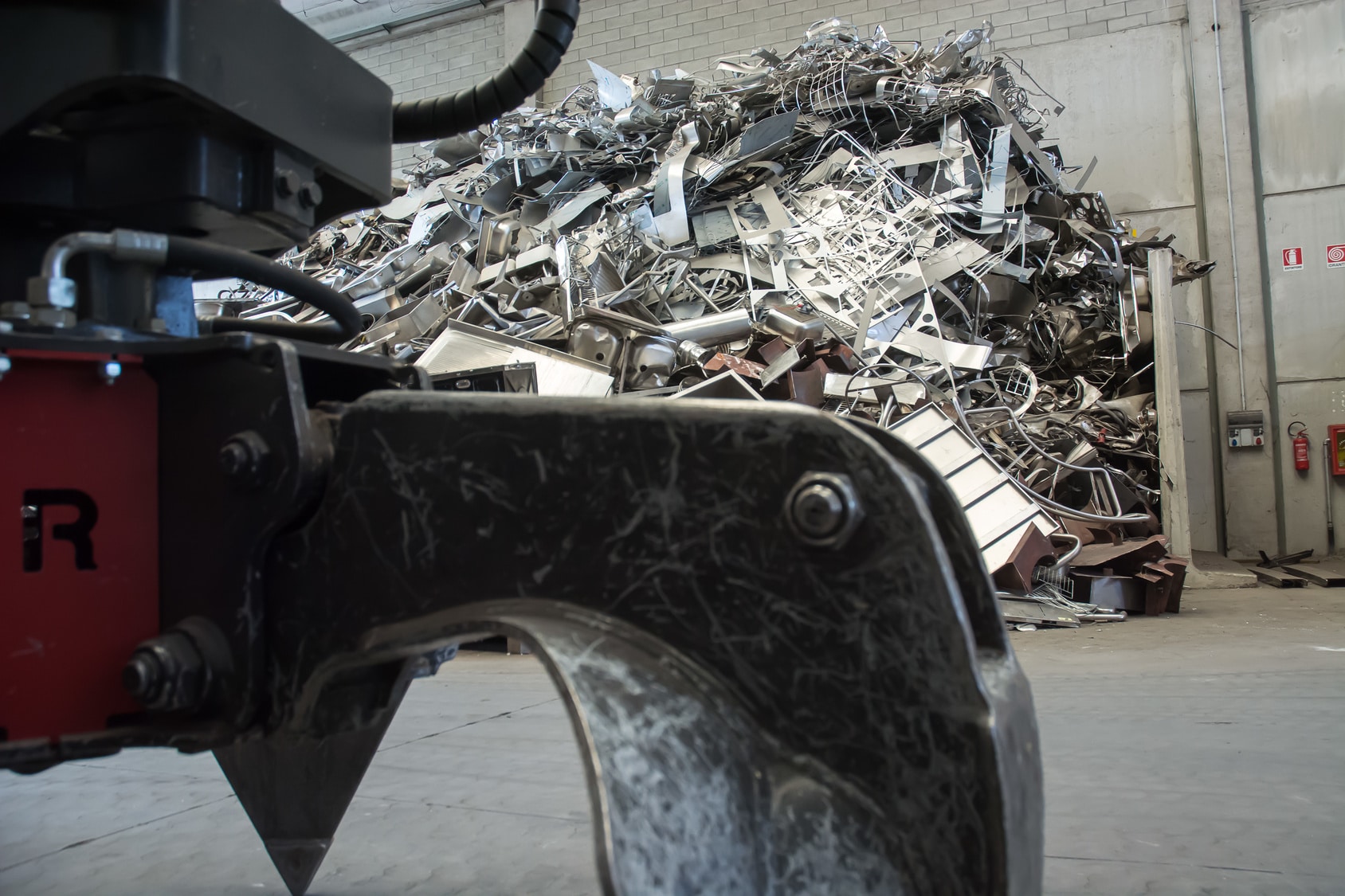 Scrap metal in warehouse and if you need a service to remove your scrap metal find one in headquartered in Burnham.