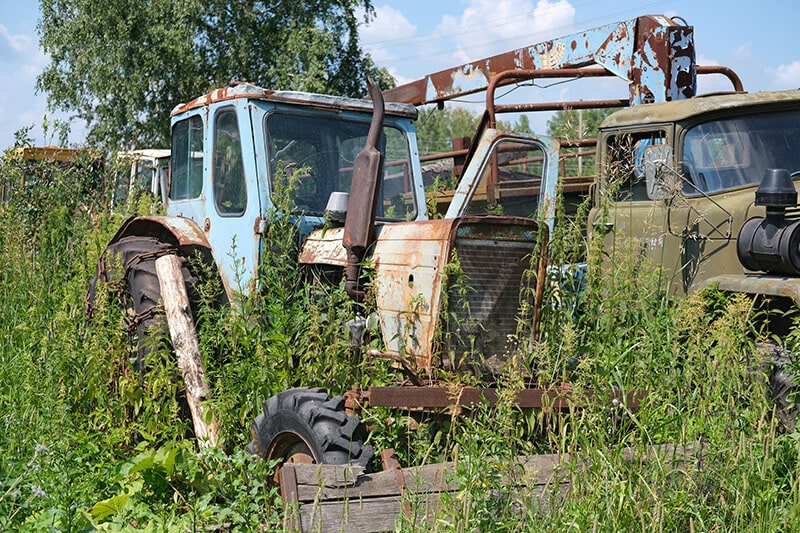 Rusty farm equipment for scrapping
